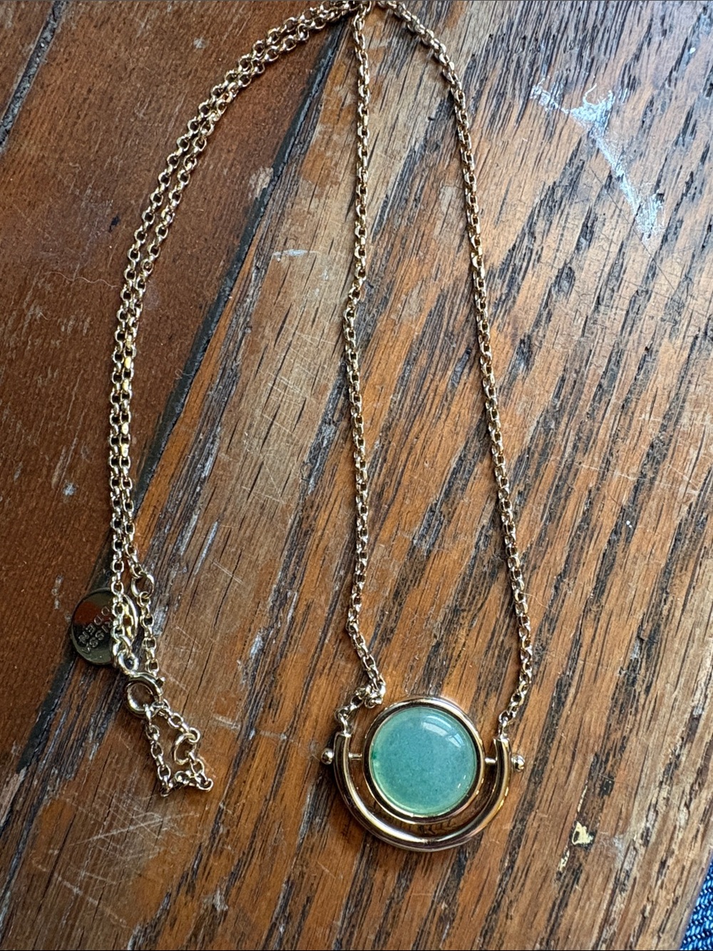 Larissa Loden Sun and Moon Gold Necklace with Jade Green Stone.